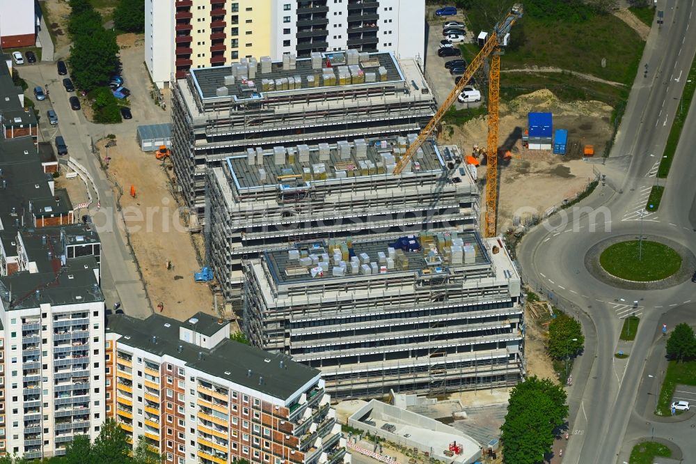 Aerial photograph Rostock - Construction site to build a new office and commercial building on Bahnhofsvorplatz in the district Suedstadt in Rostock in the state Mecklenburg - Western Pomerania, Germany