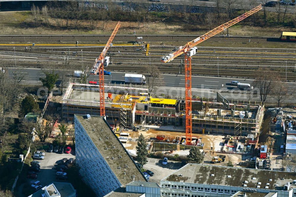 Aerial photograph Berlin - Construction site to build a new office and commercial building on street Epiphanienweg in the district Westend in Berlin, Germany