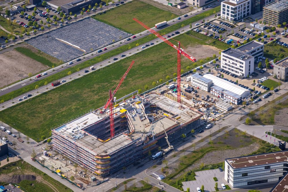 Aerial photograph Dortmund - Construction site to build a new office and commercial building on Robert-Schuman-Strasse in the district Phoenix West in Dortmund at Ruhrgebiet in the state North Rhine-Westphalia, Germany