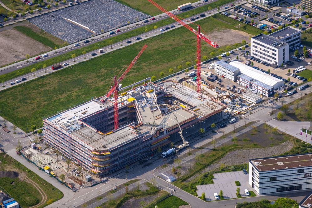 Dortmund from the bird's eye view: Construction site to build a new office and commercial building from the Amprion GmbH on Robert-Schuman-Strasse in the district Phoenix West in Dortmund at Ruhrgebiet in the state North Rhine-Westphalia, Germany