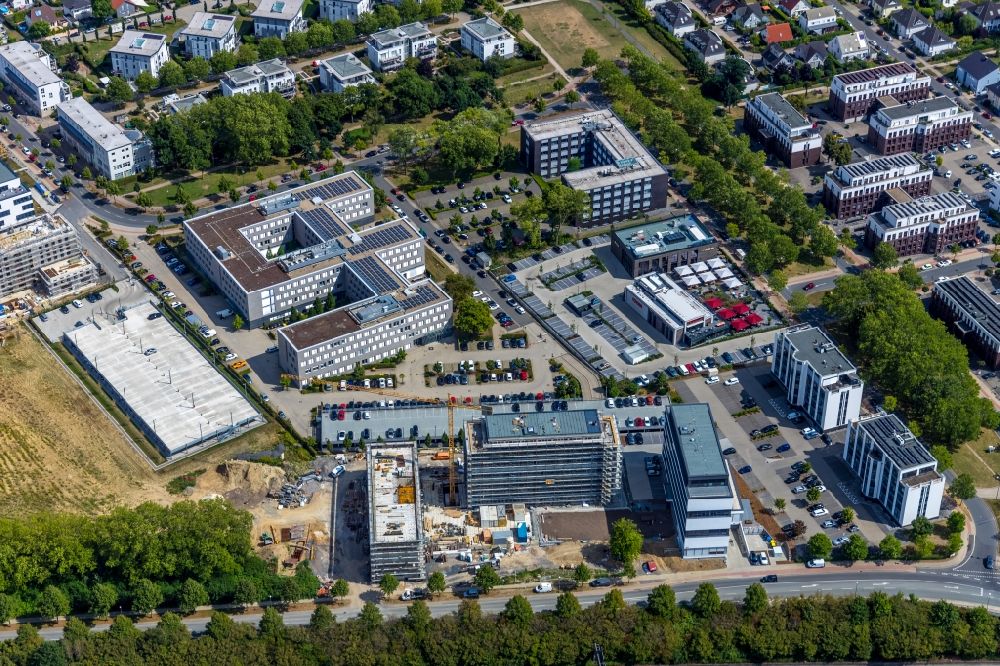 Dortmund from the bird's eye view: Construction site to build a new office and commercial building of Schuermann Immobiliengesellschaft GmbH & Co.KG on Freie-Vogel-Strasse in Dortmund in the state North Rhine-Westphalia, Germany