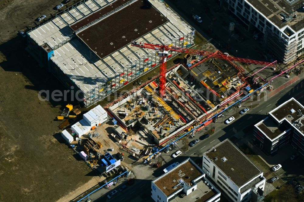 Aerial image Berlin - Construction site to build a new office and commercial building of Scienion AG on Wagner-Regeny-Strasse in the district Adlershof in Berlin, Germany