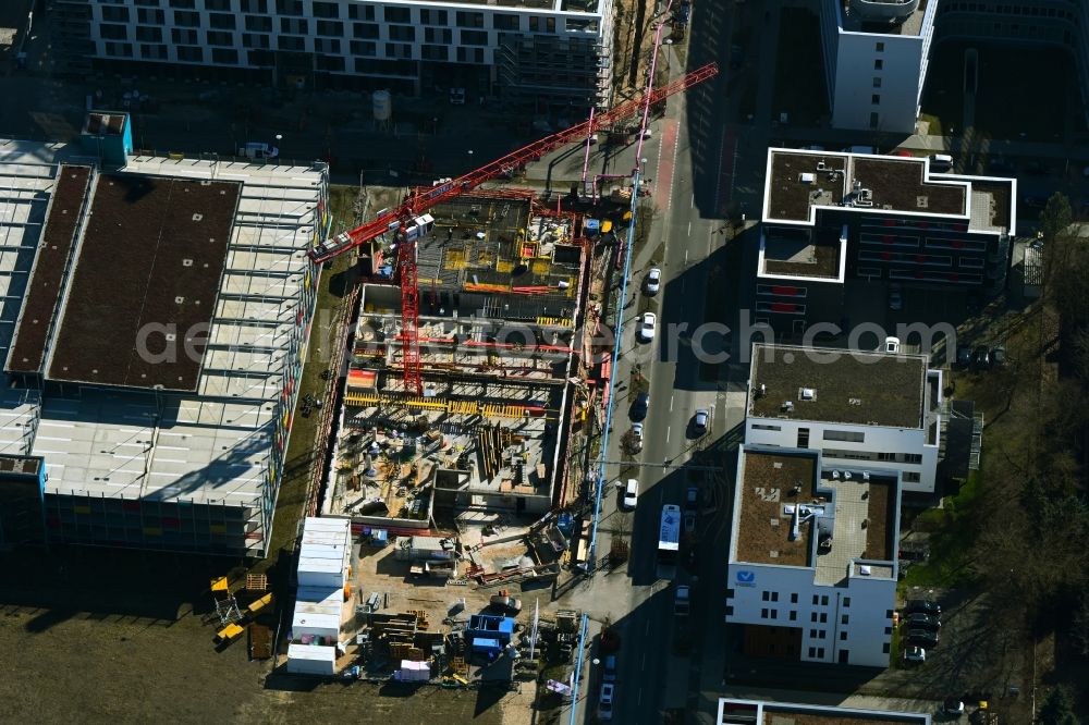Aerial photograph Berlin - Construction site to build a new office and commercial building of Scienion AG on Wagner-Regeny-Strasse in the district Adlershof in Berlin, Germany