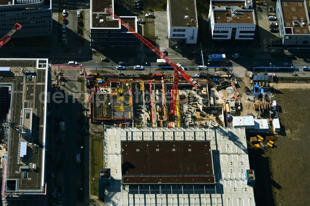 Berlin from above - Construction site to build a new office and commercial building of Scienion AG on Wagner-Regeny-Strasse in the district Adlershof in Berlin, Germany