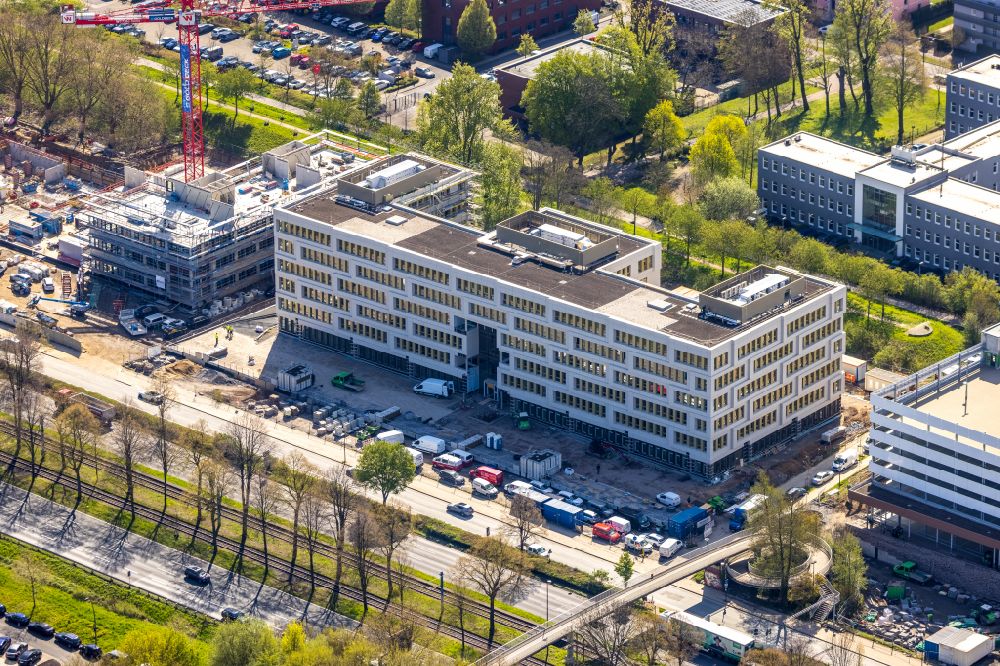 Dortmund from the bird's eye view: Construction site to build a new office and commercial building SKOFFICE by Stadtkrone-Ost on street Freie-Vogel-Strasse in the district Schueren-Neu in Dortmund at Ruhrgebiet in the state North Rhine-Westphalia, Germany
