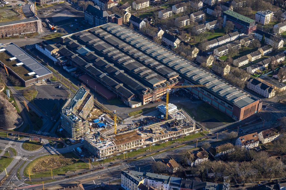Bochum from the bird's eye view: Construction site to build a new office and commercial building TRIUM - An of Jahrhunderthalle in Bochum at Ruhrgebiet in the state North Rhine-Westphalia, Germany
