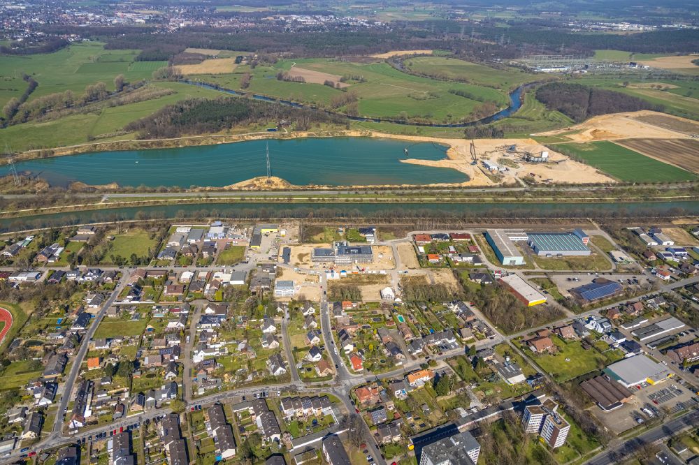 Voerde (Niederrhein) from above - Construction site to build a new office and commercial building Volksbank Rhein-Lippe in the district Friedrichsfeld in Voerde at Ruhrgebiet in the state North Rhine-Westphalia, Germany