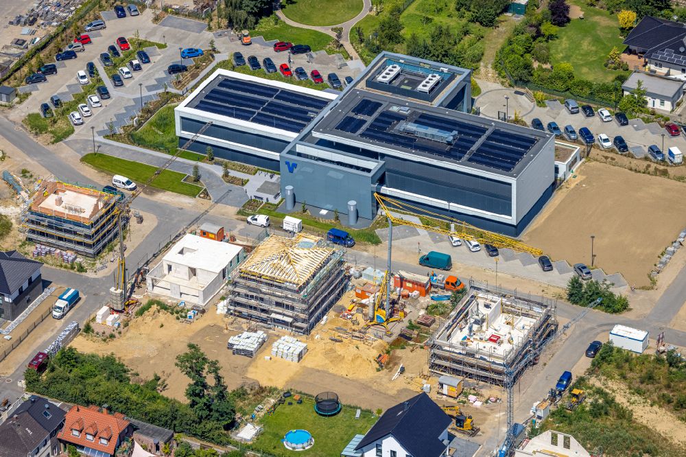 Voerde (Niederrhein) from the bird's eye view: Construction site to build a new office and commercial building Volksbank Rhein-Lippe in the district Friedrichsfeld in Voerde at Ruhrgebiet in the state North Rhine-Westphalia, Germany