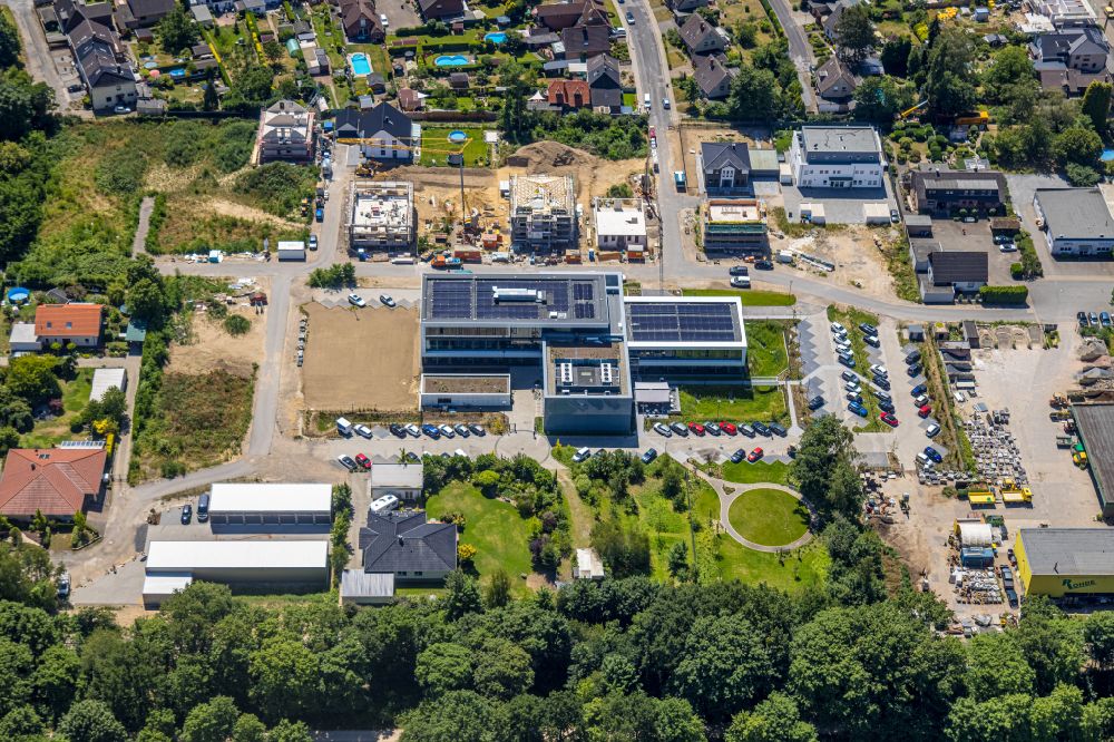Aerial image Voerde (Niederrhein) - Construction site to build a new office and commercial building Volksbank Rhein-Lippe in the district Friedrichsfeld in Voerde at Ruhrgebiet in the state North Rhine-Westphalia, Germany
