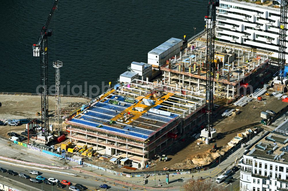 Aerial image Berlin - Construction site to build a new office and commercial building Dockyard Waterfront Offices of East-Port-Area GmbH on street Stralauer Allee in the district Friedrichshain in Berlin, Germany