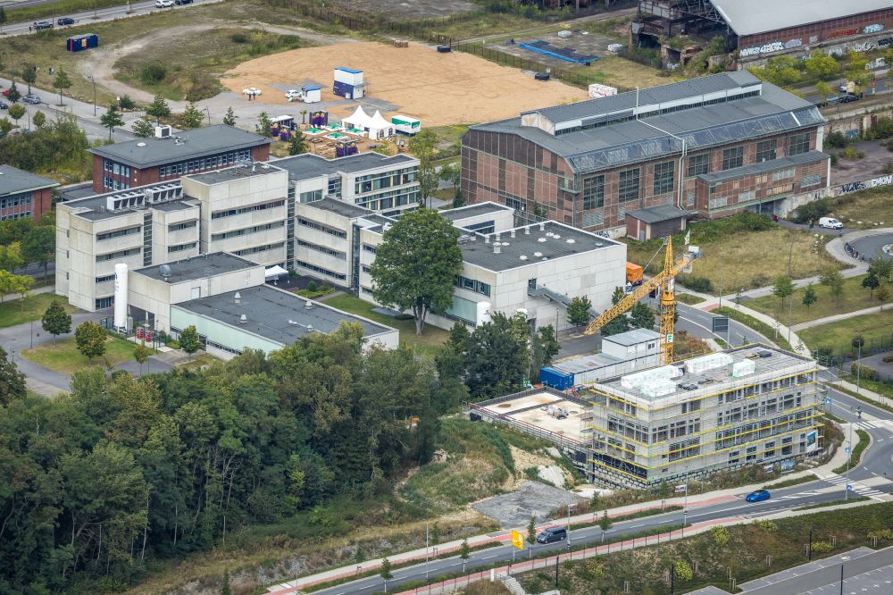 Aerial photograph Dortmund - Construction site to build a new office and commercial building der Louis Oplaender Heizungs- und Klimatechnik GmbH on the corner Nortkirchenstrasse - Olof-Palme-Strasse in the district Phoenix-West in Dortmund at Ruhrgebiet in the state North Rhine-Westphalia, Germany