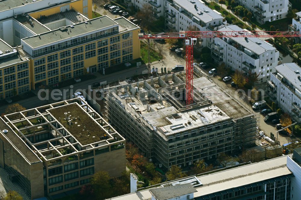 Regensburg from the bird's eye view: Construction site to build a new office and commercial building on street Dr.-Leo-Ritter-Strasse - Heinkelstrasse in Regensburg in the state Bavaria, Germany