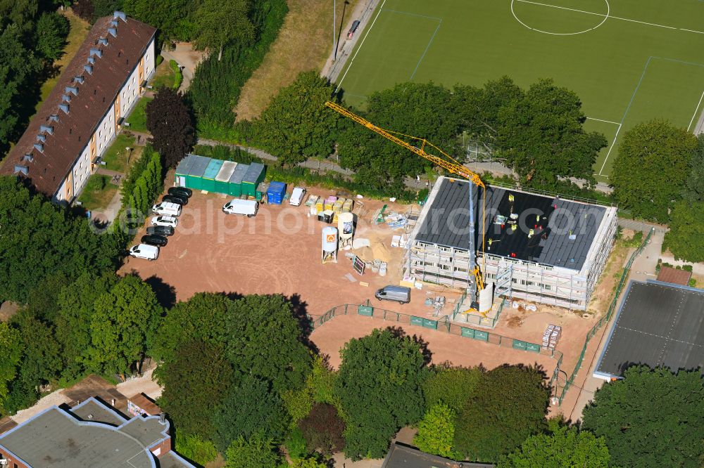 Aerial image Hamburg - Construction site to build a new office and commercial building auf of Sportanlage in the district Schnelsen in Hamburg, Germany