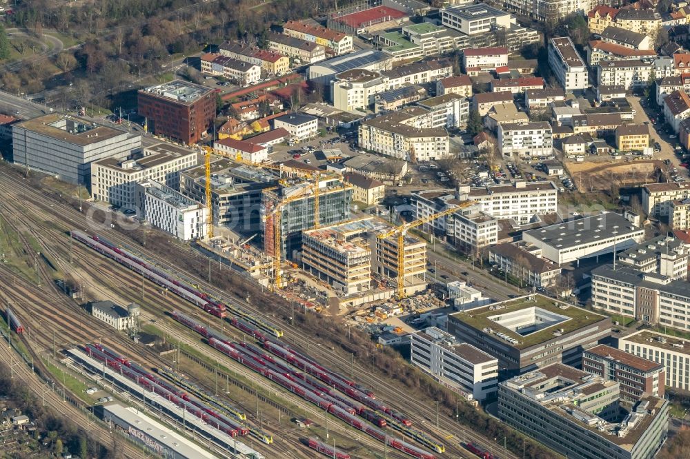 Aerial photograph Freiburg im Breisgau - Construction site to build a new office and commercial building on Heinrich-von-Stephan-Strasse in Freiburg im Breisgau in the state Baden-Wurttemberg, Germany
