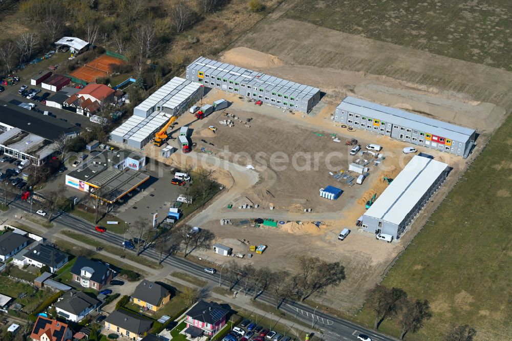 Aerial image Falkensee - Construction site to build a new refugee home and asylum accommodation container settlement as a makeshift accommodation and reception camp accommodation for refugees on Spandauer Strasse in Falkensee in the state Brandenburg, Germany