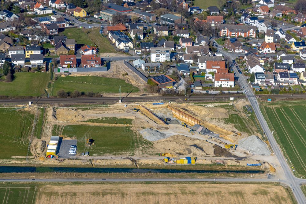 Aerial image Westtünnen - Construction site for the new construction of a tunnel - railway culvert and rainwater retention basin and water reservoir on Verdistrasse in Westtuenen in the Ruhr area in the state of North Rhine-Westphalia, Germany