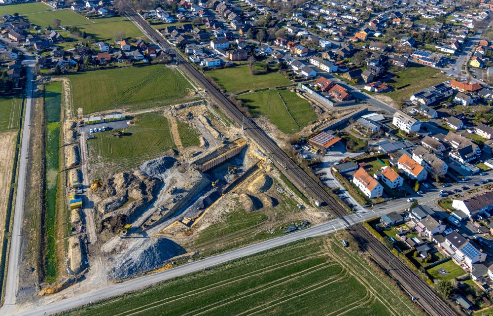Aerial image Westtünnen - Construction site for the new construction of a tunnel - railway culvert and rainwater retention basin and water reservoir on Verdistrasse in Westtuenen in the Ruhr area in the state of North Rhine-Westphalia, Germany