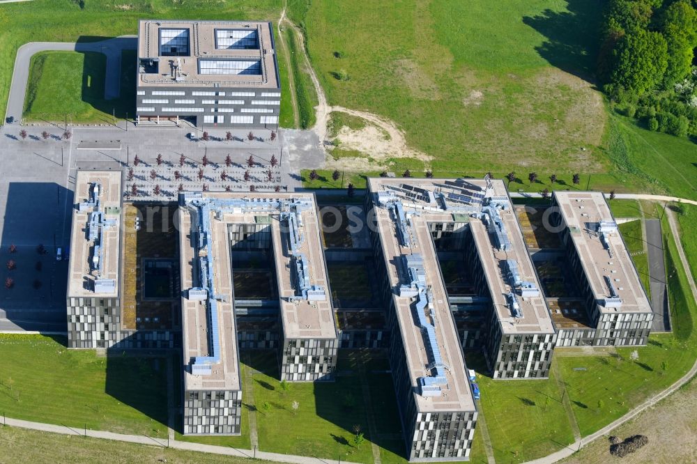 Bielefeld from the bird's eye view: View at the new building of the college and the research building interactive systems at the North Campus of the University of Bielefeld in Bielefeld in the federal state North Rhine-Westphalia. Builder is thr BLB.NRW Bau- und Liegenschaftsbetrieb Nordrhein-Westfalen, responsible for the overall planning is the the Carpus + Partner AG