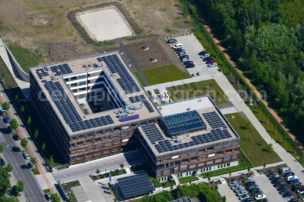 Aerial image Berlin - Construction site of the new company building of Flexim GmbH with a wooden facade on Boxberger Strasse in the district of Marzahn in Berlin