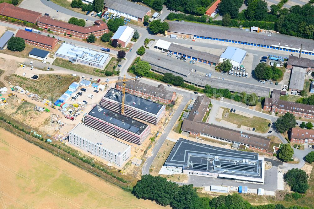 Aerial photograph Eutin - Construction site for the construction of a new police building complex accommodation building and an operational training center of the police department for basic and advanced training and for the riot police in the district of Fissau in Eutin in the state Schleswig-Holstein, Germany