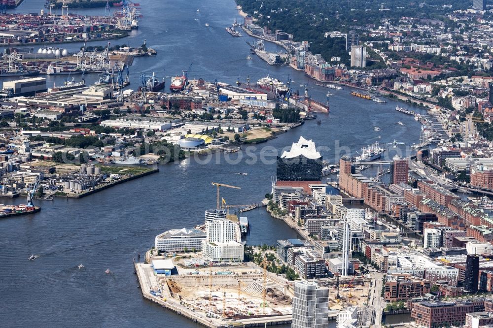 Hamburg from above - Construction site for the new building complex of the shopping center at Ueberseequartier at Chicagokai - Osakaallee in the area of the former Grasbrooks in the Hafencity district in Hamburg, Germany