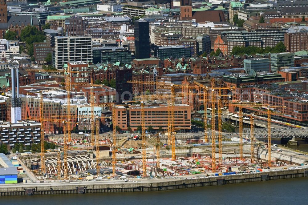 Hamburg from above - Construction site for the new building complex of the shopping center at Ueberseequartier at Chicagokai - Ueberseeallee in the Hafencity district in Hamburg, Germany
