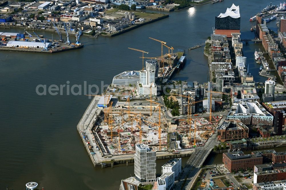 Hamburg from the bird's eye view: Construction site for the new building complex of the shopping center at Ueberseequartier at Chicagokai - Ueberseeallee in the Hafencity district in Hamburg, Germany