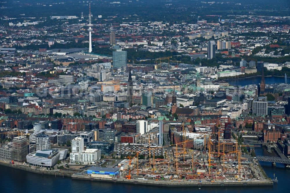 Aerial photograph Hamburg - Construction site for the new building complex of the shopping center at Ueberseequartier at Chicagokai - Ueberseeallee in the Hafencity district in the district Hafencity in Hamburg, Germany