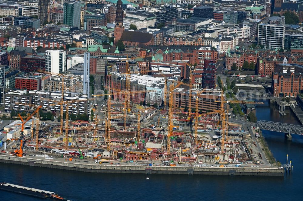 Hamburg from the bird's eye view: Construction site for the new building complex of the shopping center at Ueberseequartier at Chicagokai - Ueberseeallee in the Hafencity district in the district Hafencity in Hamburg, Germany