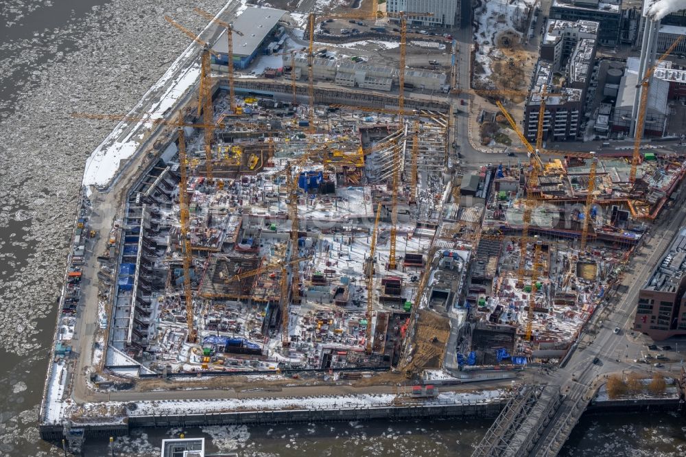 Aerial image Hamburg - Construction site for the new building complex of the shopping center at Ueberseequartier at Chicagokai - Osakaallee in the area of the former Grasbrooks in the Hafencity district in Hamburg, Germany