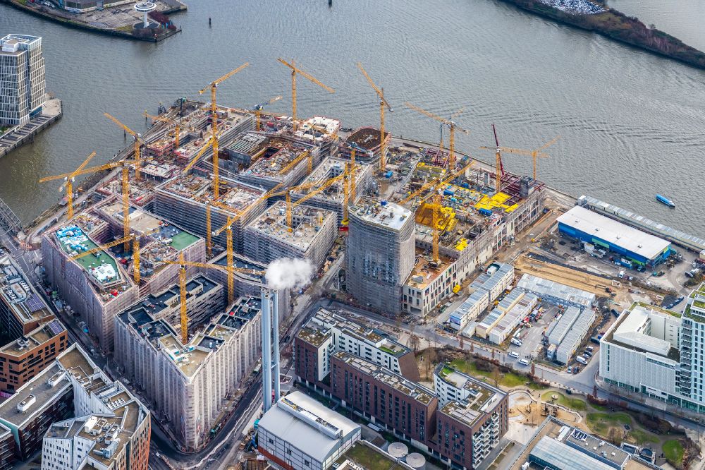 Aerial photograph Hamburg - Construction site for the new building complex of the shopping center at Ueberseequartier at Chicagokai - Osakaallee in the area of the former Grasbrooks in the Hafencity district in Hamburg, Germany