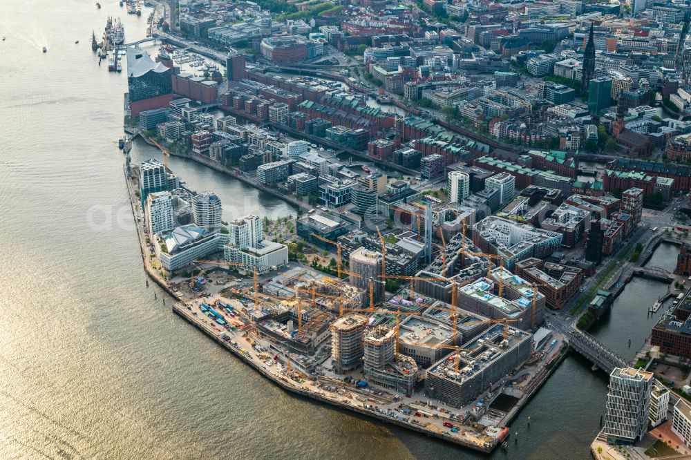 Aerial photograph Hamburg - Construction site for the new building complex of the shopping center at Ueberseequartier at Strandkai in the Hafencity district in Hamburg, Germany
