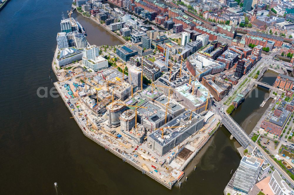 Hamburg from above - Construction site for the new building complex of the shopping center at Ueberseequartier at Strandkai in the Hafencity district in Hamburg, Germany