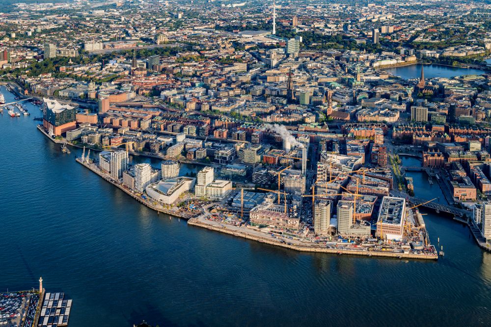 Aerial photograph Hamburg - Construction site for the new building complex of the shopping center at Ueberseequartier at Strandkai in the Hafencity district in Hamburg, Germany