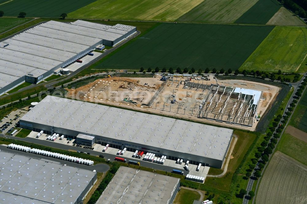Peine from the bird's eye view: Construction site to build a new building complex on the site of the logistics center NEOVIA Logistics - ACTION Distribution in the district Essinghausen in Peine in the state Lower Saxony, Germany