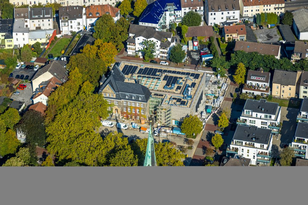 Holzwickede from the bird's eye view: Construction site of Town Hall building of the city administration as a building extension Am Markt - Poststrasse in the district Brackel in Holzwickede in the state North Rhine-Westphalia, Germany