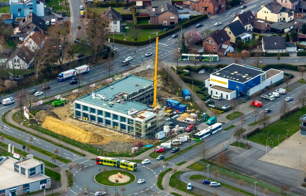 Aerial photograph Hamm - Construction site for the new construction of an office and commercial building of the Sparkasse in the district Westtuennen in Hamm in the state North Rhine-Westphalia, Germany