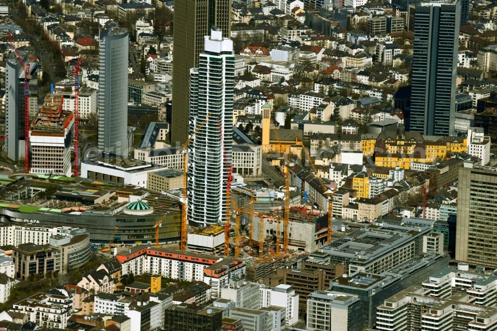 Frankfurt am Main from the bird's eye view: Construction site for new high-rise building complex The Spin before GRAND TOWER on Mainzer Landstrasse - Gueterplatz and in the background the new building of the ONE tower - formerly Tower One in the district Gallus in Frankfurt in the state Hesse, Germany