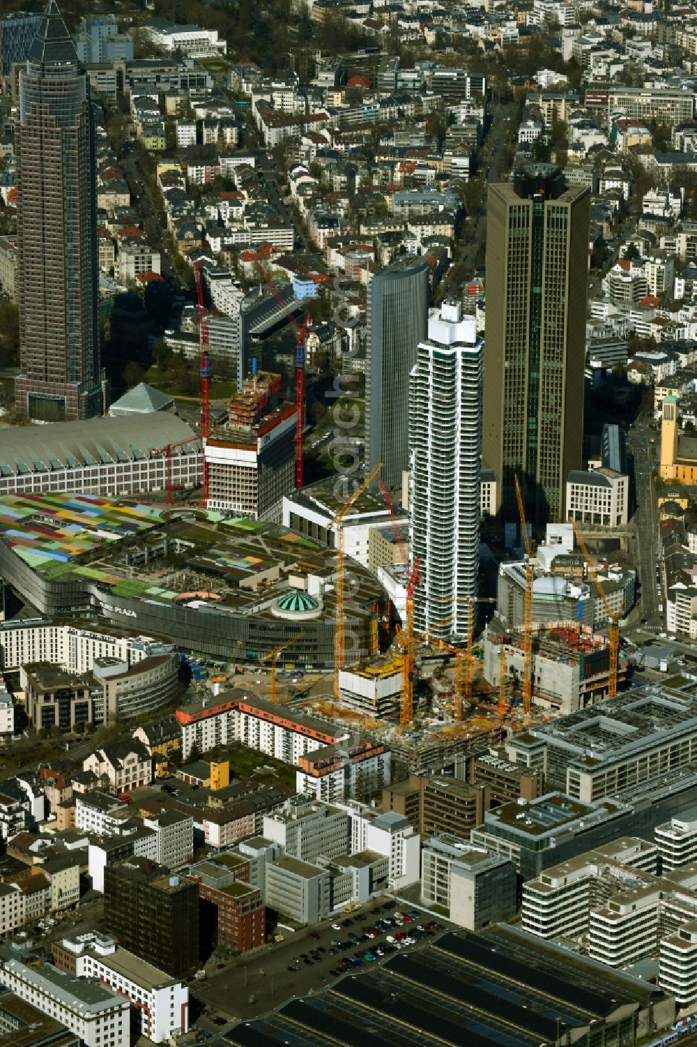 Frankfurt am Main from above - Construction site for new high-rise building complex The Spin before GRAND TOWER on Mainzer Landstrasse - Gueterplatz and in the background the new building of the ONE tower - formerly Tower One in the district Gallus in Frankfurt in the state Hesse, Germany