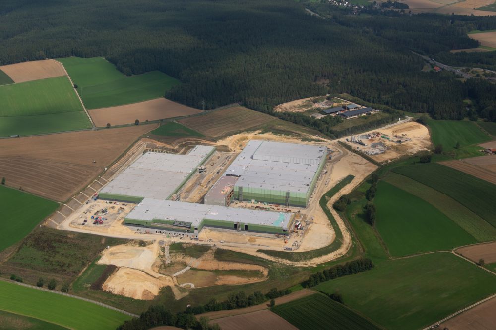 Marktredwitz from above - Construction site and assembly work for the construction of a high-bay warehouse building complex and logistics center EDEKA on street Rathaushuette in Marktredwitz in the state Bavaria, Germany