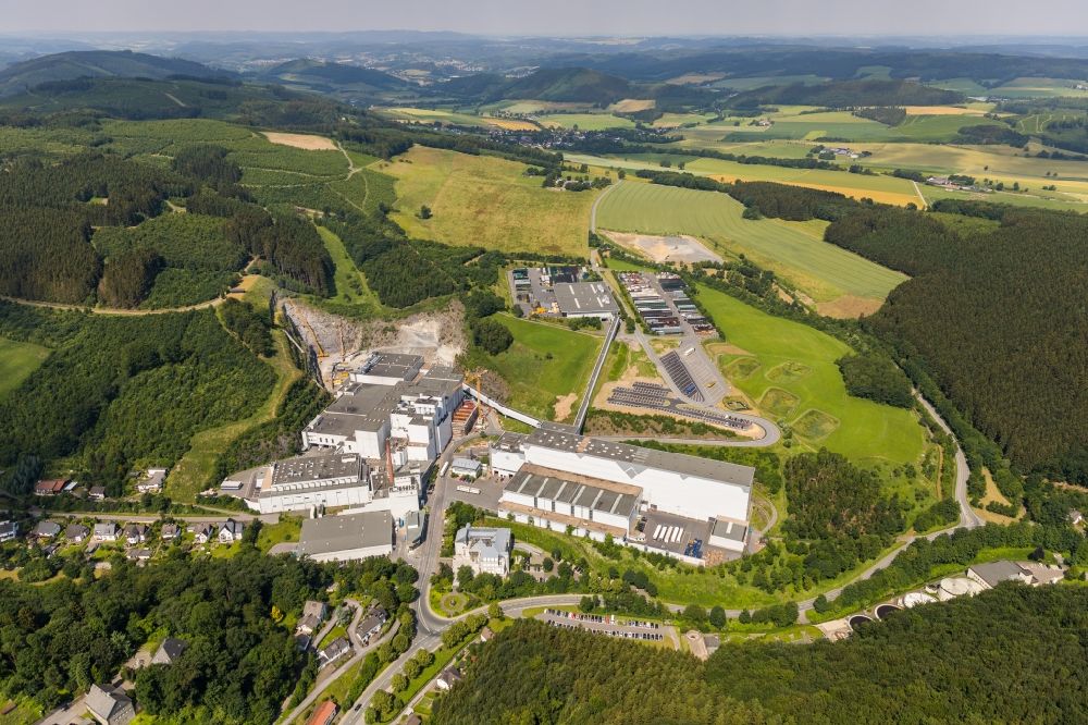 Grevenstein from above - Construction site and assembly work for the construction of a high-bay warehouse building complex and logistics center on the premises of the brewery Brauerei C.& A. VELTINS GmbH & Co. KG An of Streue in Grevenstein in the state North Rhine-Westphalia, Germany