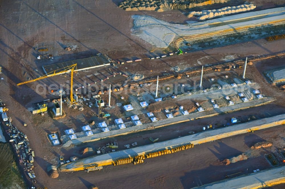 Magdeburg from above - Construction site and assembly work for the construction of a high-bay warehouse building complex and logistics center on the premises on Burger Strasse in the district Gewerbegebiet Nord in Magdeburg in the state Saxony-Anhalt, Germany