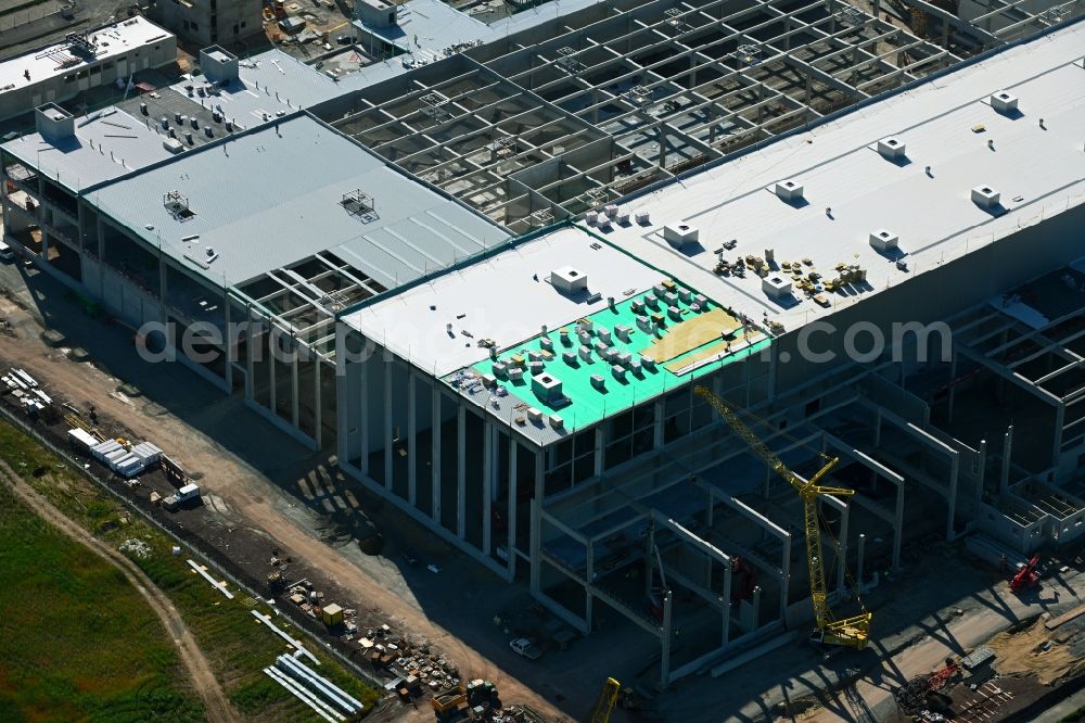Magdeburg from above - Construction site and assembly work for the construction of a high-bay warehouse building complex and logistics center on the premises on Burger Strasse in the district Gewerbegebiet Nord in Magdeburg in the state Saxony-Anhalt, Germany