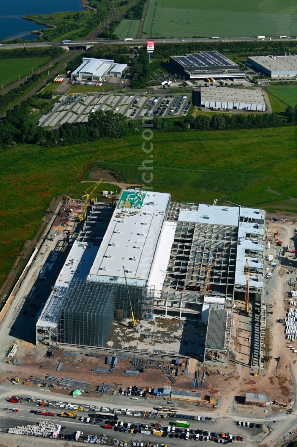 Magdeburg from the bird's eye view: Construction site and assembly work for the construction of a high-bay warehouse building complex and logistics center on the premises on Burger Strasse in the district Gewerbegebiet Nord in Magdeburg in the state Saxony-Anhalt, Germany
