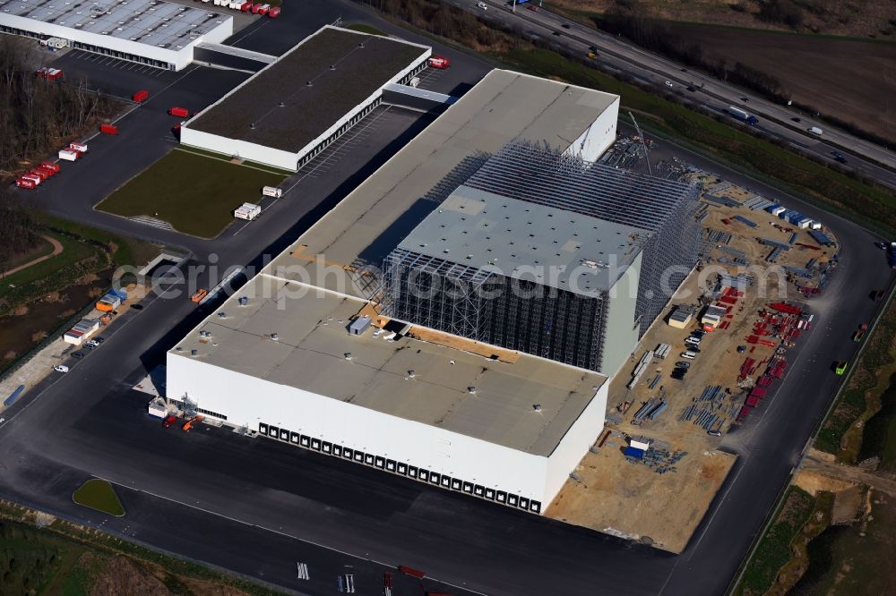 Günthersdorf from above - Construction site and assembly work for the construction of a high-bay warehouse building complex and logistics center on the premises of Hoeffner Moebelgesellschaft GmbH & Co.KG in Guenthersdorf in the state Saxony-Anhalt