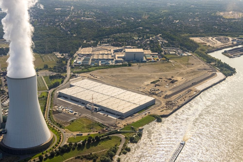 Duisburg from above - Construction site and assembly work for the construction of a high-bay warehouse building complex and logistics center on the premises of logport VI on Rheinstrasse - Faehrstrasse in Duisburg at Ruhrgebiet in the state North Rhine-Westphalia, Germany