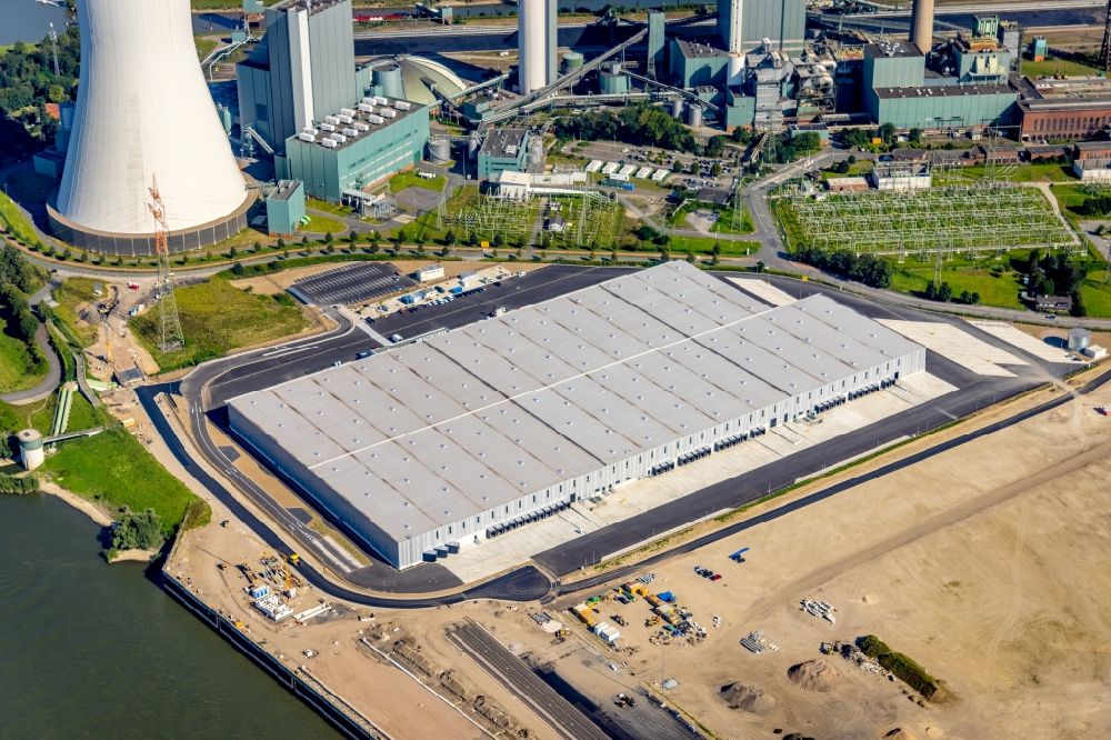 Duisburg from above - Construction site and assembly work for the construction of a high-bay warehouse building complex and logistics center on the premises of logport VI on Rheinstrasse - Faehrstrasse in Duisburg at Ruhrgebiet in the state North Rhine-Westphalia, Germany