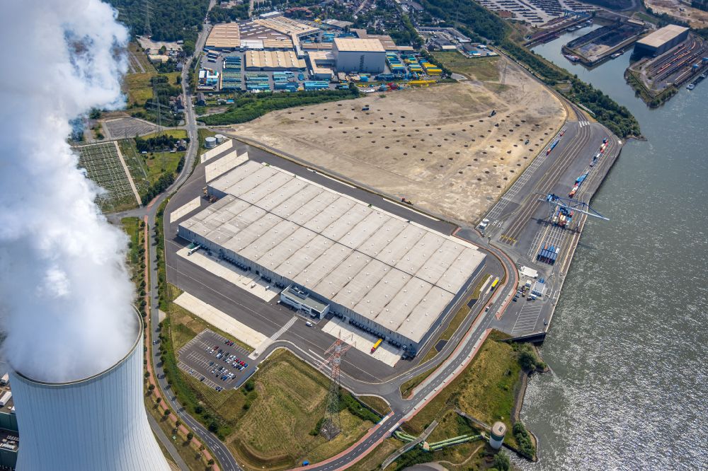 Aerial photograph Duisburg - Construction site and assembly work for the construction of a high-bay warehouse building complex and logistics center on the premises of logport VI on Rheinstrasse - Faehrstrasse in the district Walsum in Duisburg at Ruhrgebiet in the state North Rhine-Westphalia, Germany