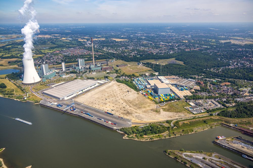 Aerial photograph Duisburg - Construction site and assembly work for the construction of a high-bay warehouse building complex and logistics center on the premises of logport VI on Rheinstrasse - Faehrstrasse in the district Walsum in Duisburg at Ruhrgebiet in the state North Rhine-Westphalia, Germany