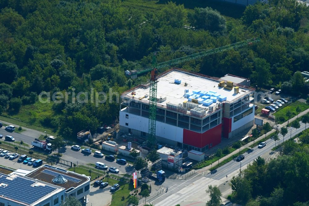 Aerial photograph Berlin - Construction site and assembly work for the construction of a high-bay warehouse building complex and logistics center on the premises of the Shurgard Germany GmbH on Pablo-Picasso-Strasse in the district Hohenschoenhausen in Berlin, Germany